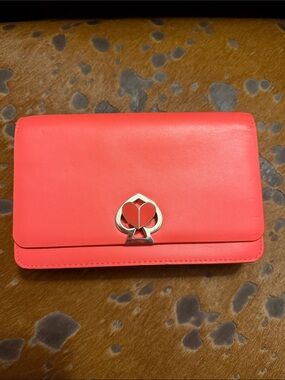 kate spade Coral Leather Clutch with Silver Spade Emblem
